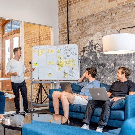 MCM Digital Products team collaborating on website strategy and sitemap development.